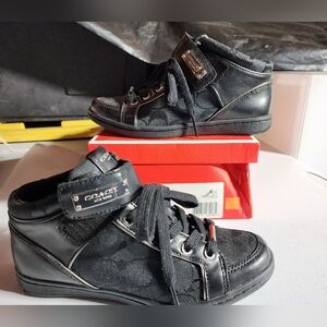 Coach Black Women's Sneakers

Did not fit a little tight on the toes!!!😩😩😩!!!